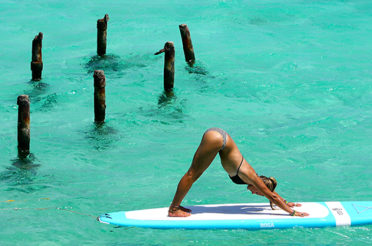 Why surfers are practicing Yoga.